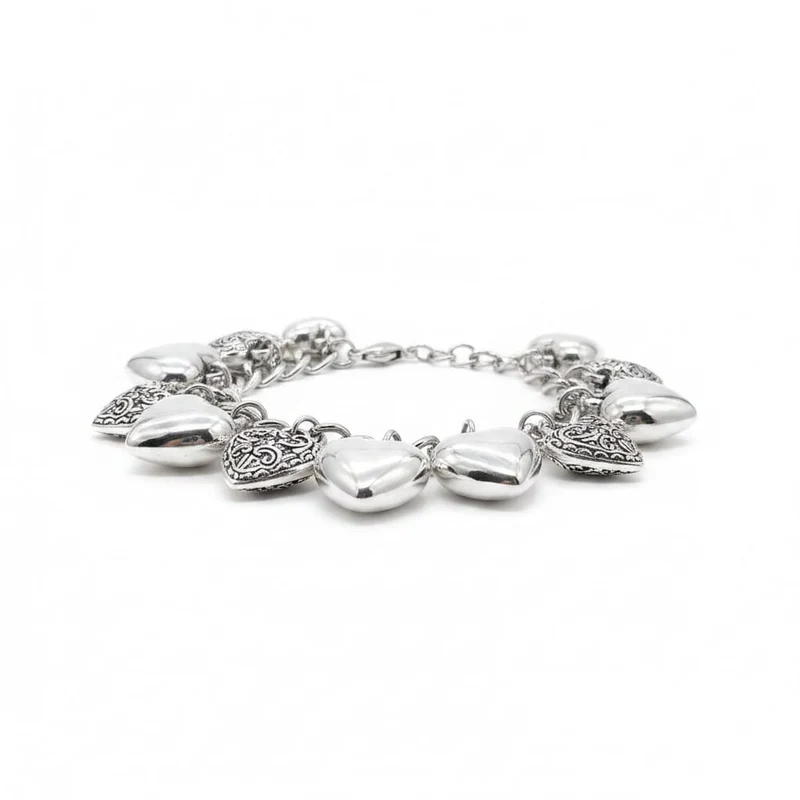 Bracciale di cuori lisci e intarsiati - Argento