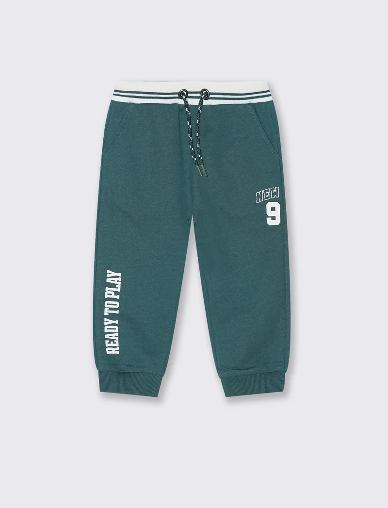 Jogger con baschina a righe - Verde