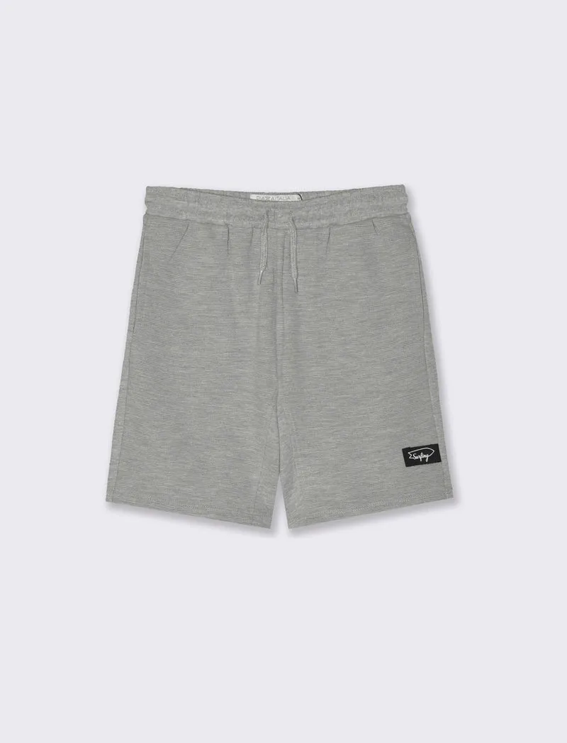 Bermuda in felpa lavorata da bambino - Grigio mel.