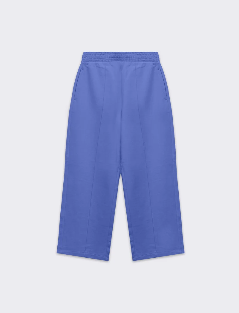 Jogger gamba larga con tasche da bambina - Azzurro